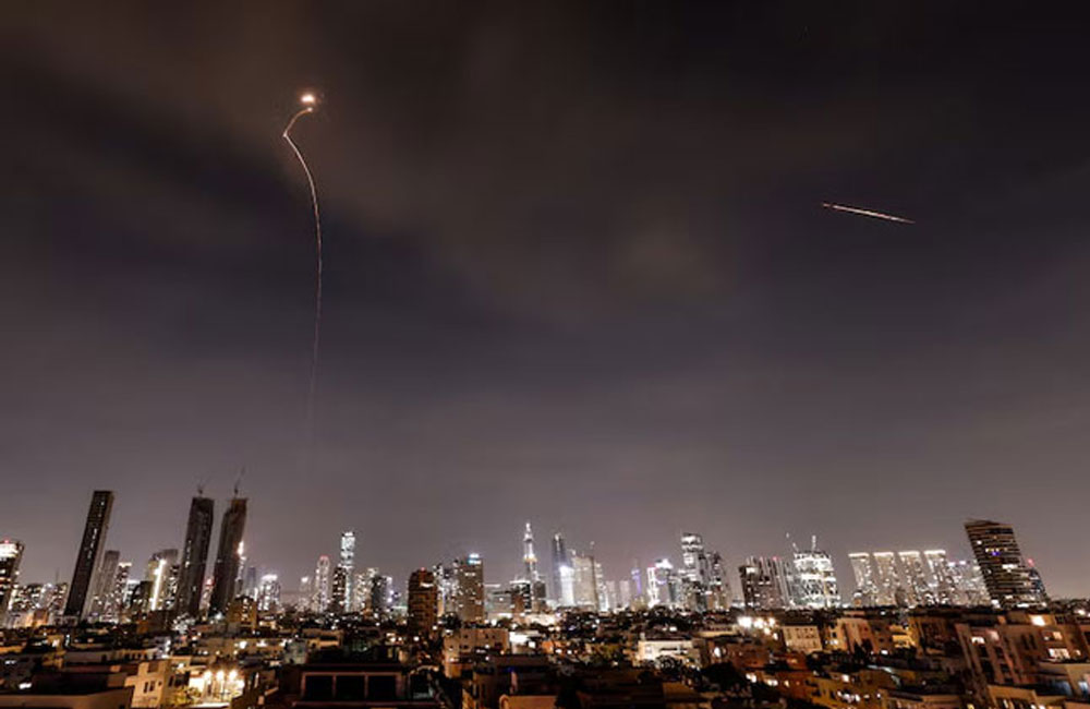 Iran sends waves of missiles into Israel, dismisses Trump’s talk of negotiations as ‘fake news’