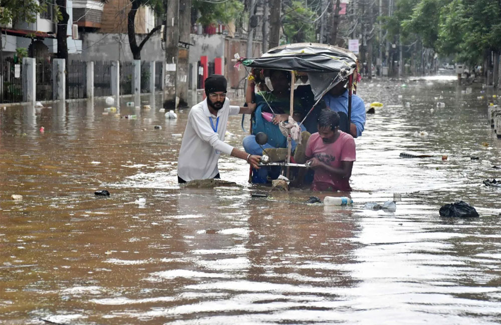 India monsoon floods, landslides kill more than 100 since July