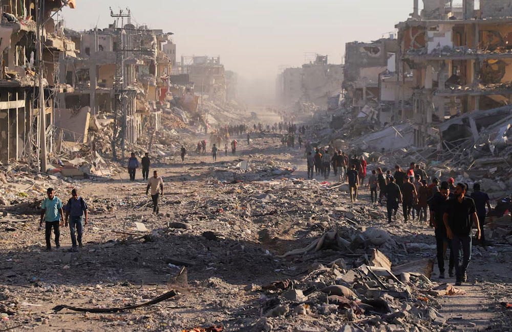 Gazans return to wrecked homes as Israeli forces pull back under ceasefire