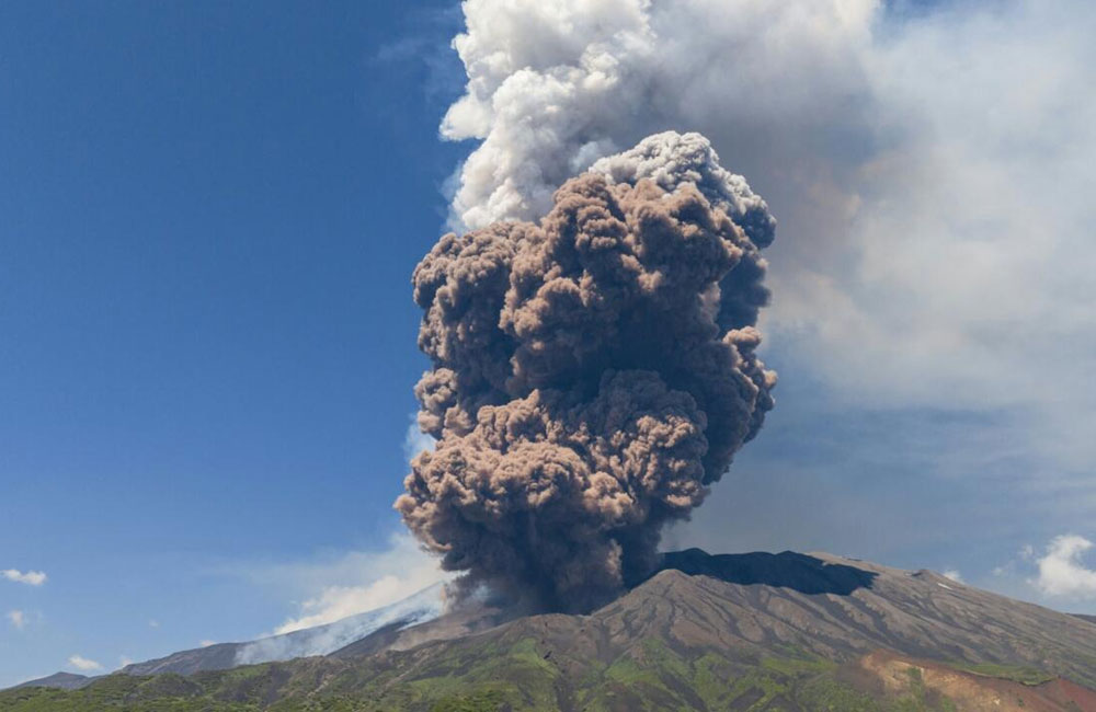 Italy’s Mount Etna erupts as large plumes rise from volcano