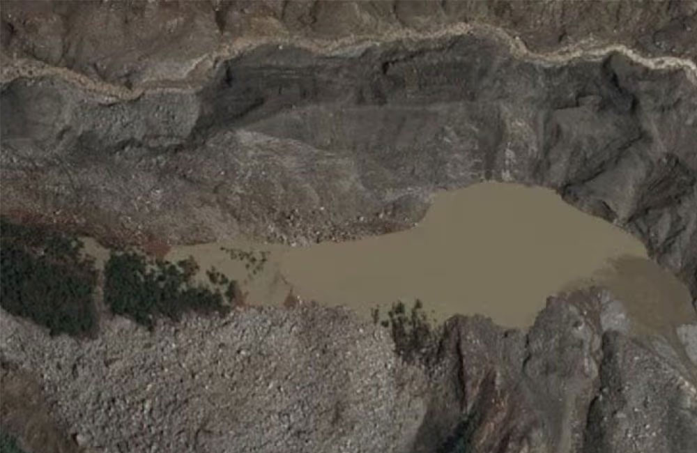Nepal monitoring two lakes, flood risk to remain until they're fully drained, official says