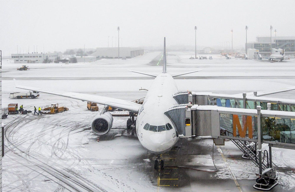 Six dead and hundreds of flights cancelled as snow causes chaos across Europe