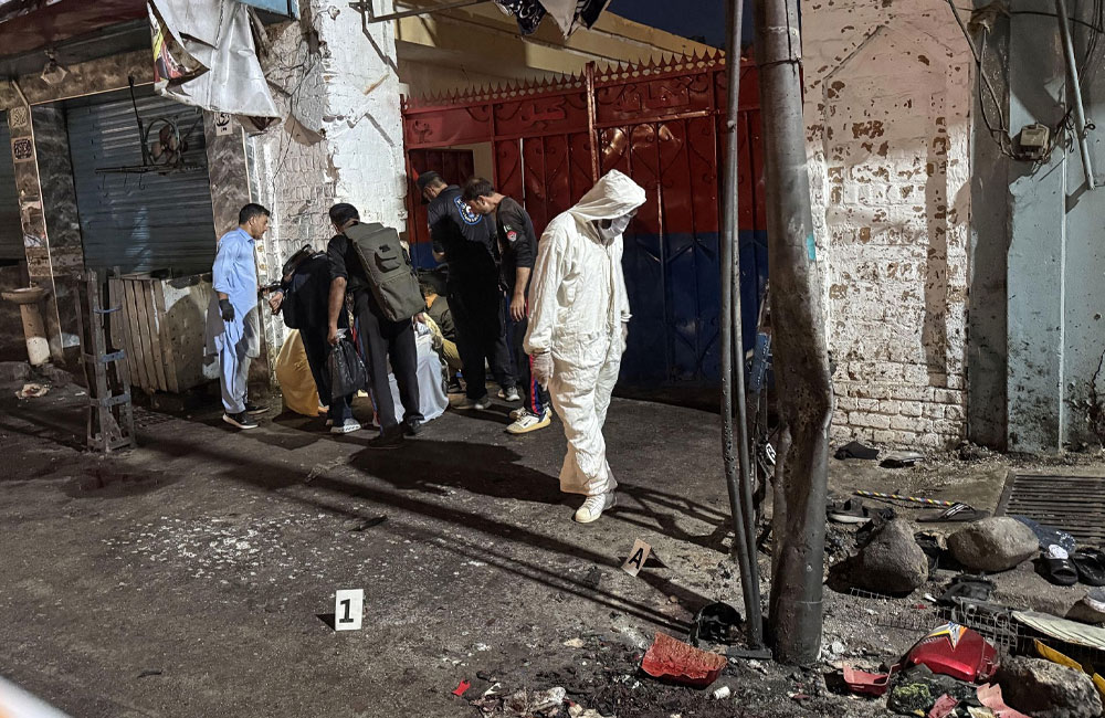 Suspected suicide bombing at police station kills at least 14 in Pakistan, officials say